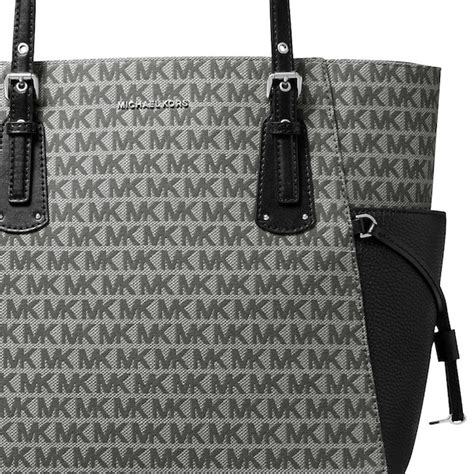 michael michael kors east west signature jacquard tote|Michael Kors voyager tote.